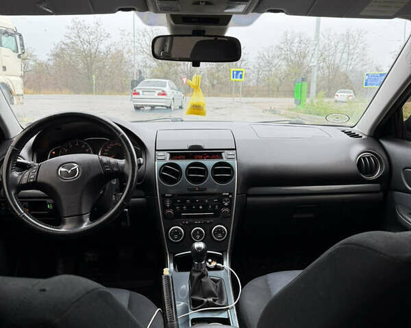 Черный Мазда 6, объемом двигателя 2 л и пробегом 213 тыс. км за 4300 $, фото 11 на Automoto.ua