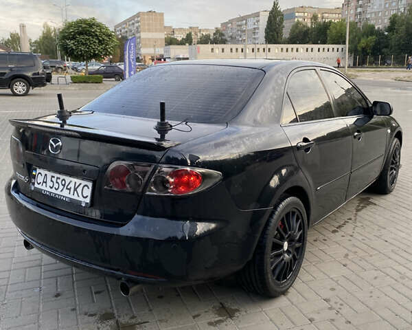 Черный Мазда 6, объемом двигателя 2 л и пробегом 320 тыс. км за 5350 $, фото 1 на Automoto.ua