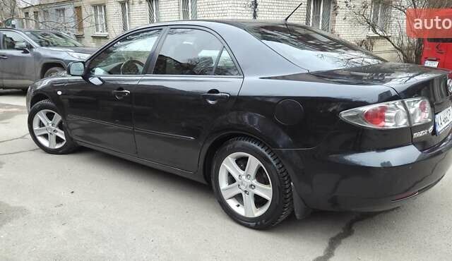 Черный Мазда 6, объемом двигателя 2 л и пробегом 266 тыс. км за 5200 $, фото 5 на Automoto.ua