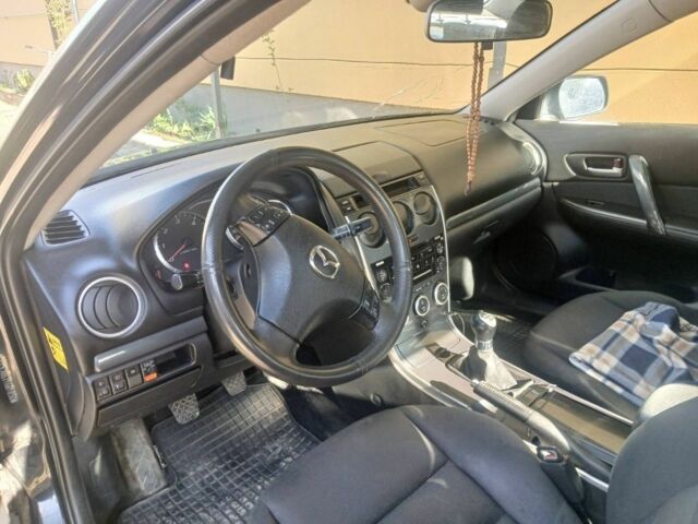 Черный Мазда 6, объемом двигателя 2 л и пробегом 360 тыс. км за 2400 $, фото 2 на Automoto.ua