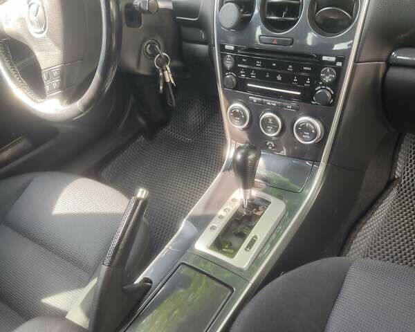 Чорний Мазда 6, об'ємом двигуна 2 л та пробігом 187 тис. км за 7000 $, фото 21 на Automoto.ua