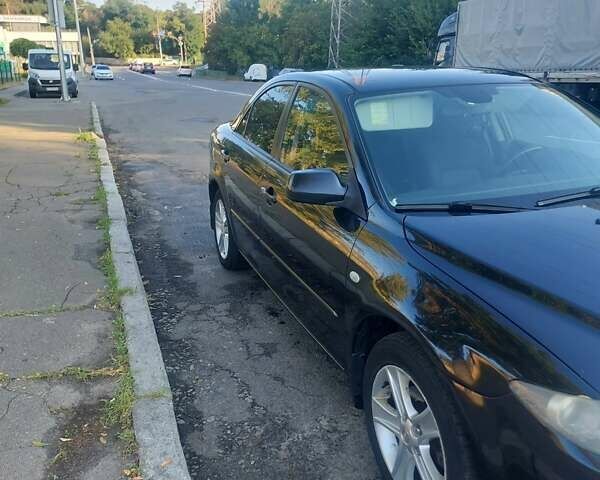 Чорний Мазда 6, об'ємом двигуна 2 л та пробігом 195 тис. км за 5500 $, фото 4 на Automoto.ua