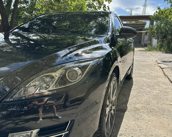 Черный Мазда 6, объемом двигателя 2 л и пробегом 232 тыс. км за 7900 $, фото 2 на Automoto.ua