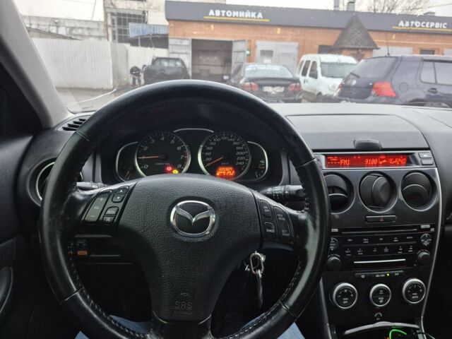 Чорний Мазда 6, об'ємом двигуна 1.8 л та пробігом 306 тис. км за 4200 $, фото 7 на Automoto.ua
