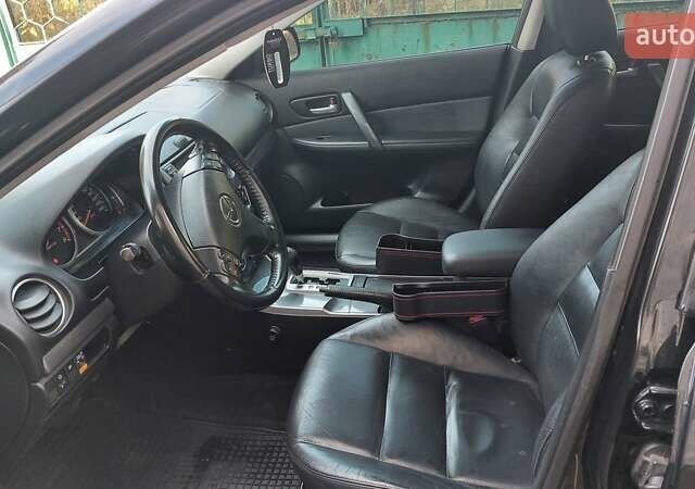 Черный Мазда 6, объемом двигателя 2 л и пробегом 163 тыс. км за 6500 $, фото 8 на Automoto.ua