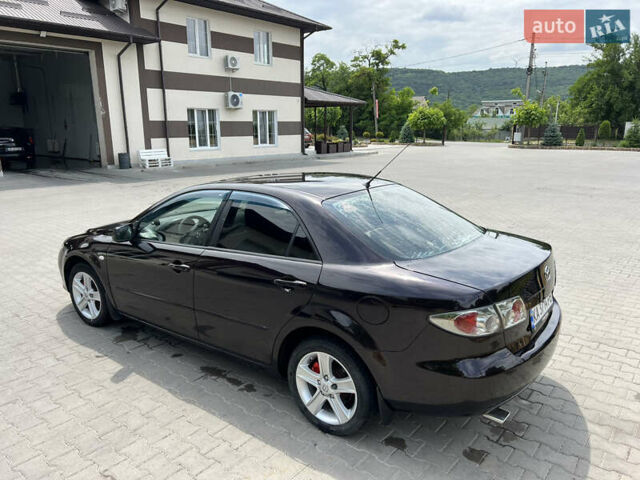 Черный Мазда 6, объемом двигателя 2 л и пробегом 221 тыс. км за 5200 $, фото 4 на Automoto.ua