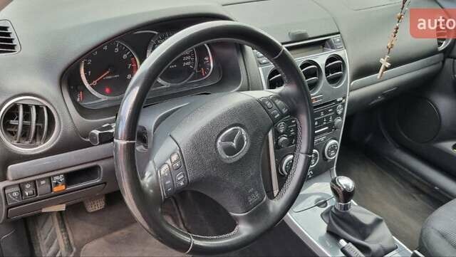Черный Мазда 6, объемом двигателя 2 л и пробегом 235 тыс. км за 5100 $, фото 11 на Automoto.ua