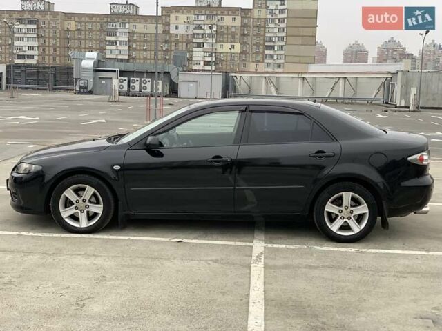 Черный Мазда 6, объемом двигателя 2 л и пробегом 209 тыс. км за 5550 $, фото 7 на Automoto.ua