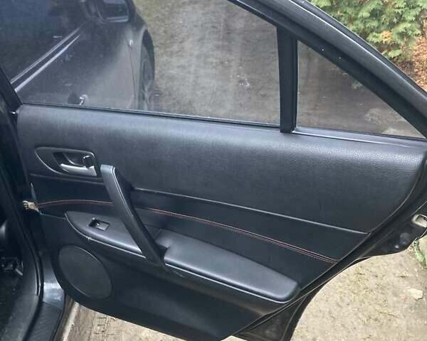Чорний Мазда 6, об'ємом двигуна 1.8 л та пробігом 314 тис. км за 4200 $, фото 12 на Automoto.ua