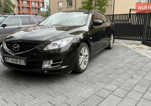 Черный Мазда 6, объемом двигателя 2 л и пробегом 400 тыс. км за 6000 $, фото 1 на Automoto.ua