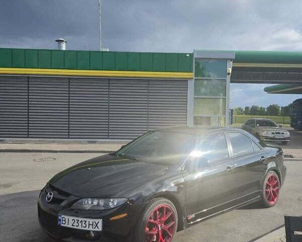 Черный Мазда 6, объемом двигателя 2.3 л и пробегом 270 тыс. км за 8000 $, фото 6 на Automoto.ua