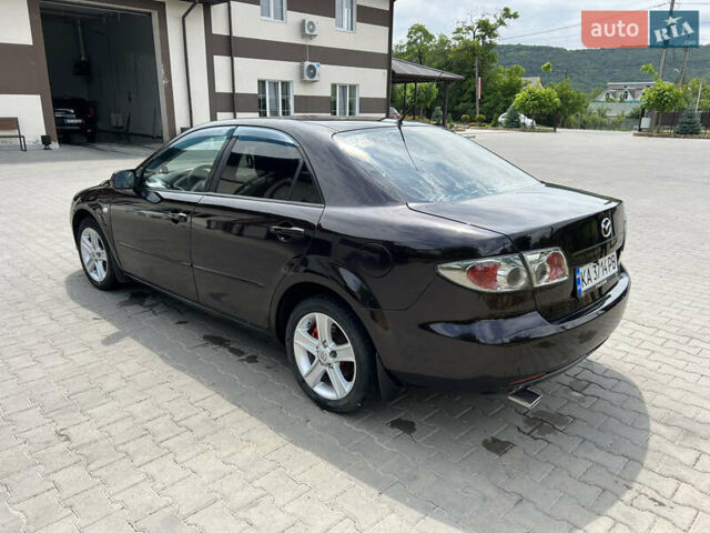 Черный Мазда 6, объемом двигателя 2 л и пробегом 221 тыс. км за 5200 $, фото 5 на Automoto.ua