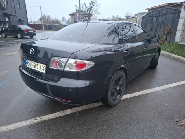 Черный Мазда 6, объемом двигателя 2 л и пробегом 335 тыс. км за 4650 $, фото 1 на Automoto.ua
