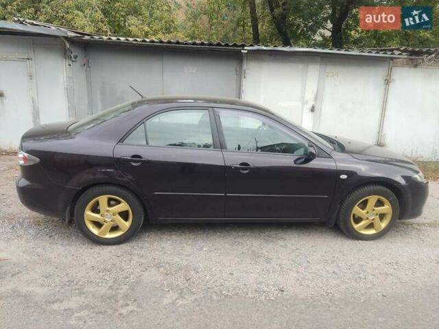 Чорний Мазда 6, об'ємом двигуна 2 л та пробігом 187 тис. км за 7000 $, фото 2 на Automoto.ua