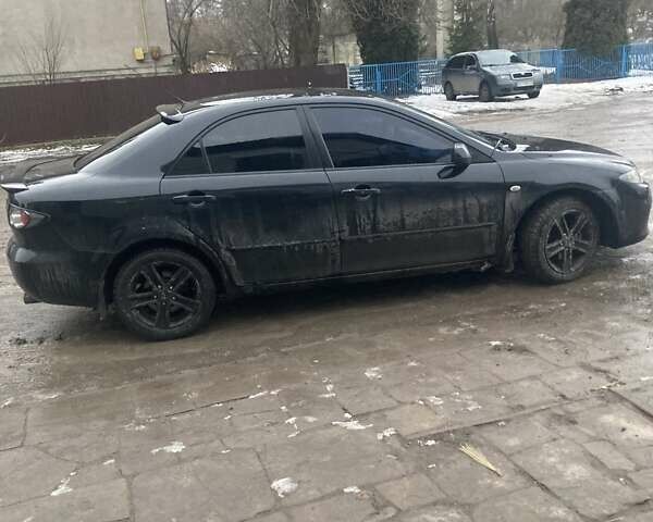 Чорний Мазда 6, об'ємом двигуна 1.8 л та пробігом 314 тис. км за 4200 $, фото 6 на Automoto.ua