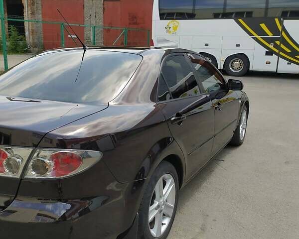 Черный Мазда 6, объемом двигателя 2 л и пробегом 235 тыс. км за 5350 $, фото 5 на Automoto.ua