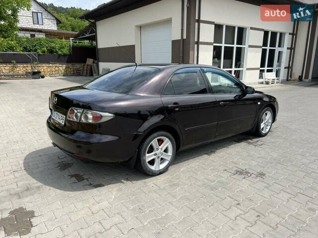 Черный Мазда 6, объемом двигателя 2 л и пробегом 221 тыс. км за 5200 $, фото 6 на Automoto.ua