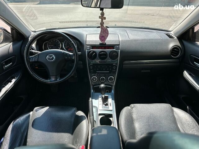 Черный Мазда 6, объемом двигателя 2 л и пробегом 162 тыс. км за 5990 $, фото 11 на Automoto.ua