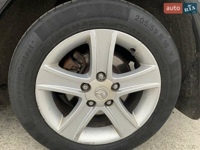 Черный Мазда 6, объемом двигателя 2 л и пробегом 209 тыс. км за 5550 $, фото 8 на Automoto.ua