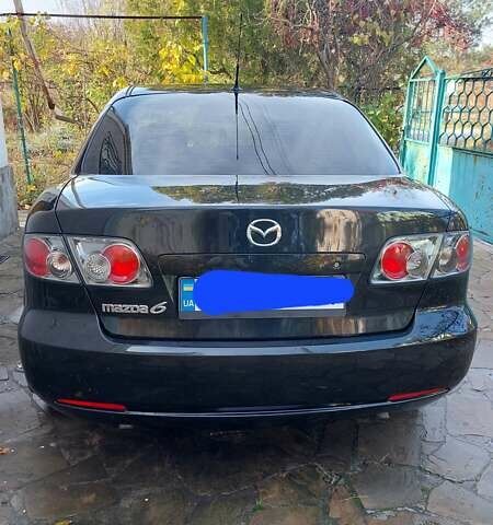 Черный Мазда 6, объемом двигателя 2 л и пробегом 163 тыс. км за 6500 $, фото 13 на Automoto.ua