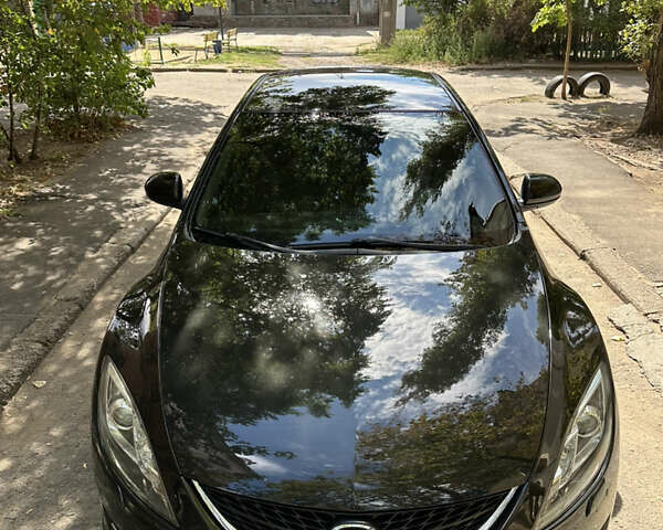 Черный Мазда 6, объемом двигателя 2 л и пробегом 232 тыс. км за 7900 $, фото 1 на Automoto.ua