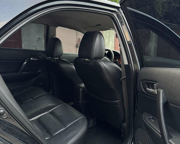 Черный Мазда 6, объемом двигателя 2.3 л и пробегом 269 тыс. км за 5300 $, фото 5 на Automoto.ua