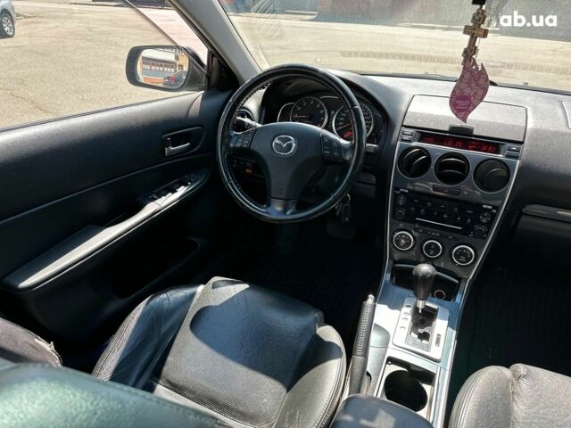 Черный Мазда 6, объемом двигателя 2 л и пробегом 162 тыс. км за 5990 $, фото 12 на Automoto.ua