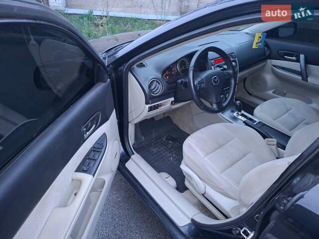 Чорний Мазда 6, об'ємом двигуна 2 л та пробігом 335 тис. км за 4650 $, фото 4 на Automoto.ua