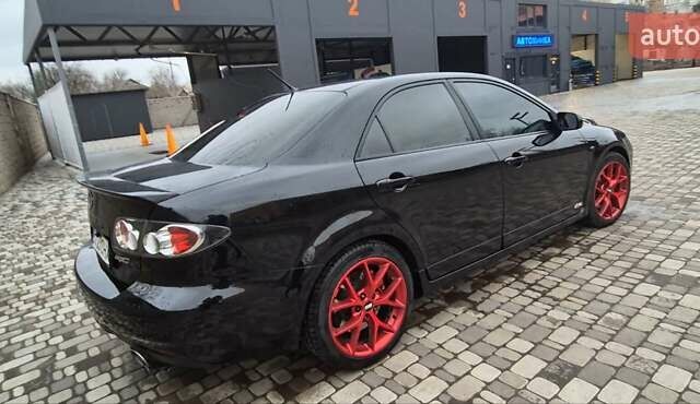 Черный Мазда 6, объемом двигателя 2.3 л и пробегом 270 тыс. км за 8000 $, фото 4 на Automoto.ua