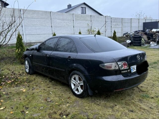 Черный Мазда 6, объемом двигателя 1.8 л и пробегом 245 тыс. км за 1650 $, фото 2 на Automoto.ua