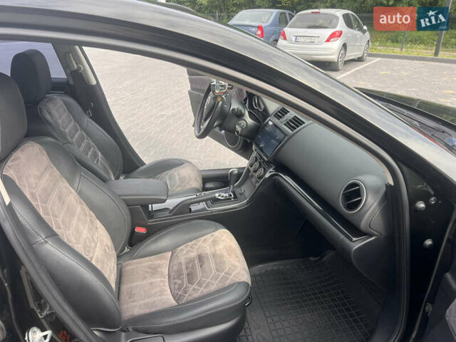 Черный Мазда 6, объемом двигателя 2 л и пробегом 220 тыс. км за 7100 $, фото 11 на Automoto.ua