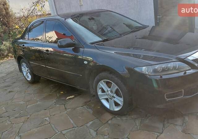 Черный Мазда 6, объемом двигателя 2 л и пробегом 163 тыс. км за 6500 $, фото 10 на Automoto.ua