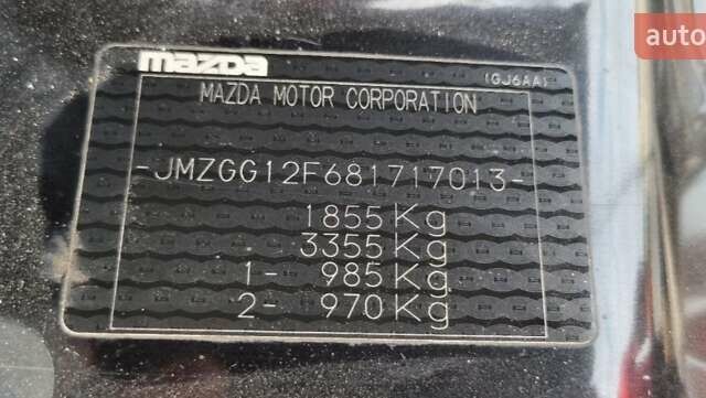 Черный Мазда 6, объемом двигателя 2 л и пробегом 235 тыс. км за 5100 $, фото 1 на Automoto.ua