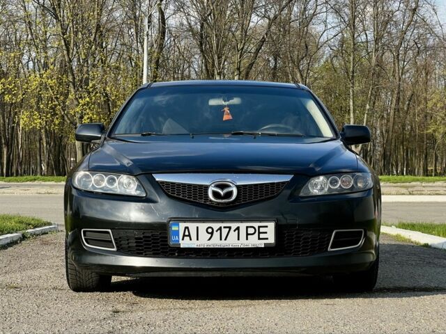 Черный Мазда 6, объемом двигателя 2 л и пробегом 314 тыс. км за 5800 $, фото 2 на Automoto.ua