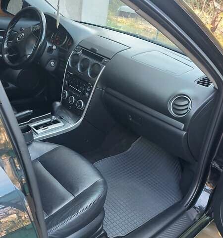 Черный Мазда 6, объемом двигателя 2 л и пробегом 163 тыс. км за 6500 $, фото 9 на Automoto.ua