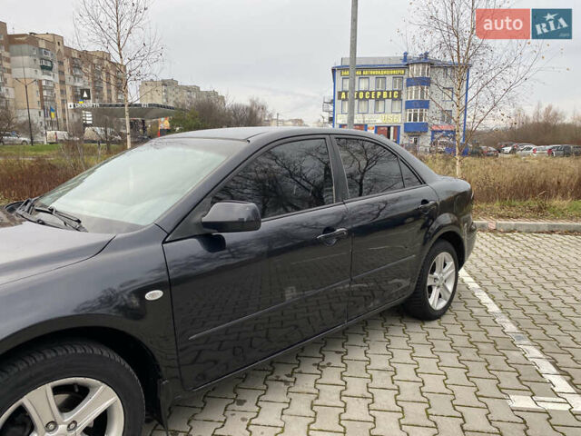 Чорний Мазда 6, об'ємом двигуна 1.8 л та пробігом 231 тис. км за 3600 $, фото 7 на Automoto.ua