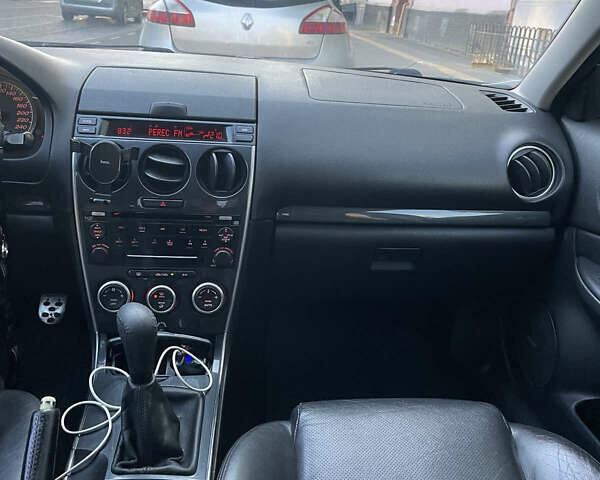 Черный Мазда 6, объемом двигателя 2.3 л и пробегом 269 тыс. км за 5300 $, фото 6 на Automoto.ua