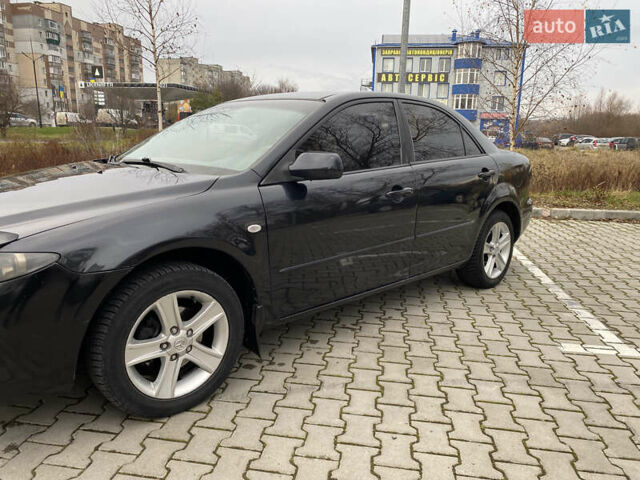 Чорний Мазда 6, об'ємом двигуна 1.8 л та пробігом 231 тис. км за 3600 $, фото 4 на Automoto.ua