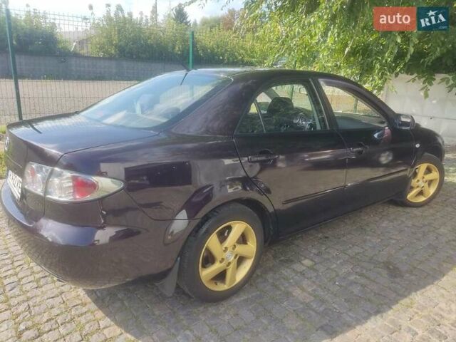 Чорний Мазда 6, об'ємом двигуна 2 л та пробігом 187 тис. км за 7000 $, фото 5 на Automoto.ua