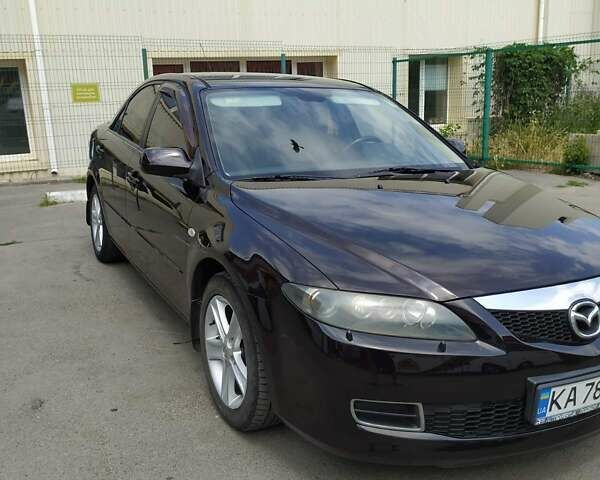 Черный Мазда 6, объемом двигателя 2 л и пробегом 235 тыс. км за 5350 $, фото 7 на Automoto.ua