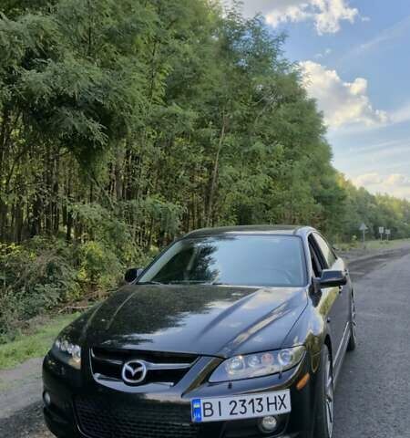 Черный Мазда 6, объемом двигателя 2.3 л и пробегом 270 тыс. км за 8000 $, фото 1 на Automoto.ua