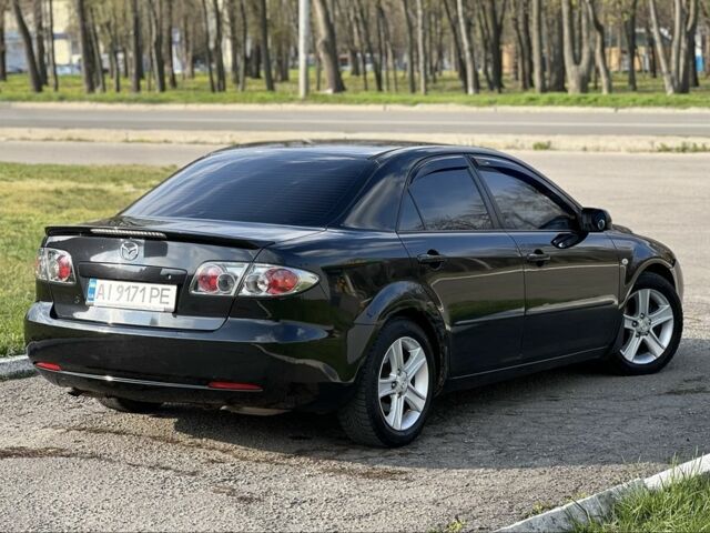 Черный Мазда 6, объемом двигателя 2 л и пробегом 314 тыс. км за 5800 $, фото 9 на Automoto.ua