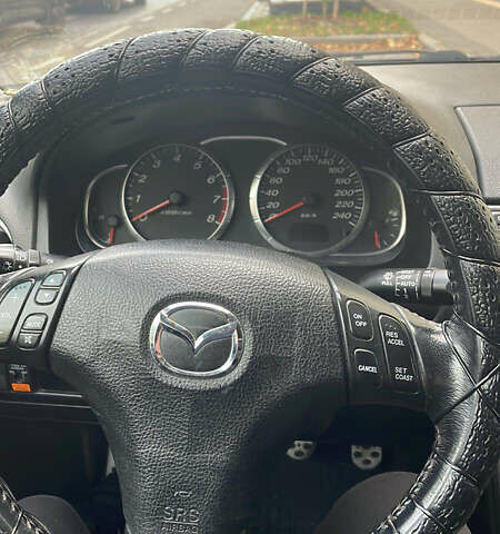 Черный Мазда 6, объемом двигателя 2.3 л и пробегом 269 тыс. км за 5300 $, фото 11 на Automoto.ua