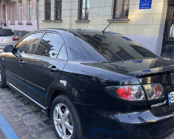 Черный Мазда 6, объемом двигателя 2.3 л и пробегом 269 тыс. км за 5300 $, фото 3 на Automoto.ua