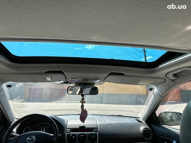 Черный Мазда 6, объемом двигателя 2 л и пробегом 162 тыс. км за 5990 $, фото 14 на Automoto.ua