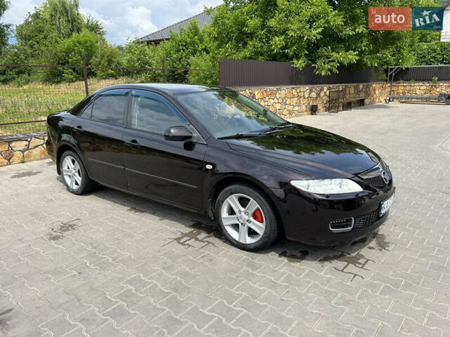 Черный Мазда 6, объемом двигателя 2 л и пробегом 221 тыс. км за 5200 $, фото 7 на Automoto.ua
