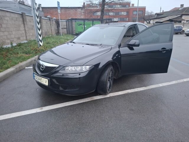 Черный Мазда 6, объемом двигателя 2 л и пробегом 335 тыс. км за 4650 $, фото 5 на Automoto.ua