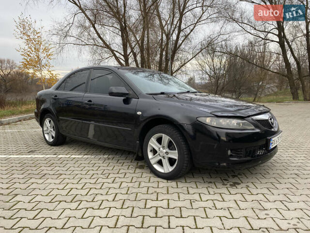 Чорний Мазда 6, об'ємом двигуна 1.8 л та пробігом 231 тис. км за 3600 $, фото 1 на Automoto.ua