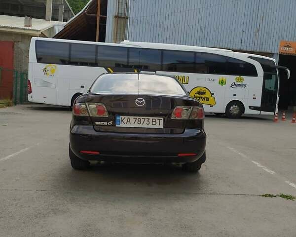 Черный Мазда 6, объемом двигателя 2 л и пробегом 235 тыс. км за 5350 $, фото 6 на Automoto.ua