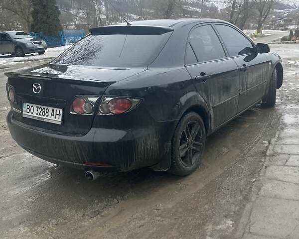 Чорний Мазда 6, об'ємом двигуна 1.8 л та пробігом 314 тис. км за 4200 $, фото 4 на Automoto.ua